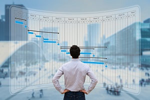 manager working with Gantt chart planning on virtual screen with city background | remote hoa management services