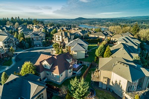 Beautiful luxury neighborhood in the Pacific Northwest photographed at sunset from the air | hoa meaning