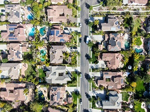 aerial view suburban neighborhood with identical wealthy villas next to each other | california's accessory dwelling unit law