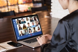 business woman work remotely at home video conference remote call to corporate group. Meeting online,videocall, group discuss online concept with screen of teamwork on laptop | hoa virtual meetings