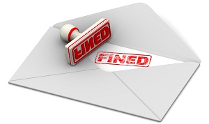 red seal and imprint "FINED" on the sheet of open postal envelope | hoa compliance