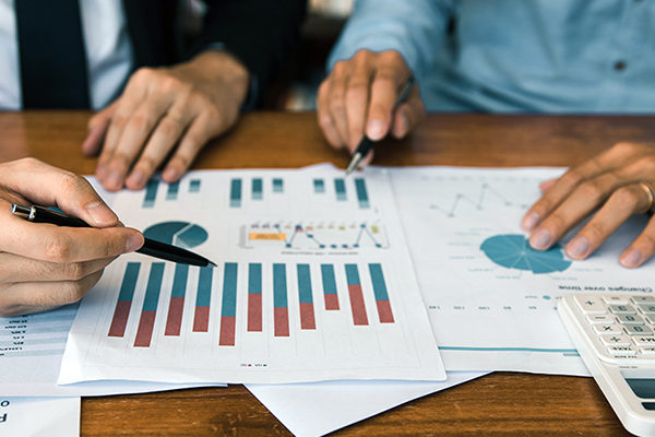 Two businessmen discussion analysis sharing calculations about the HOA budget Two businessmen discussion analysis sharing calculations about the HOA budget | HOA finance committee