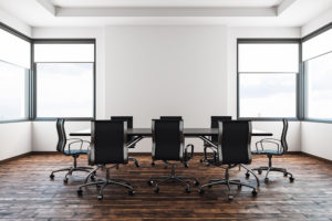 Contemporary meeting room | What does the finance committee do?